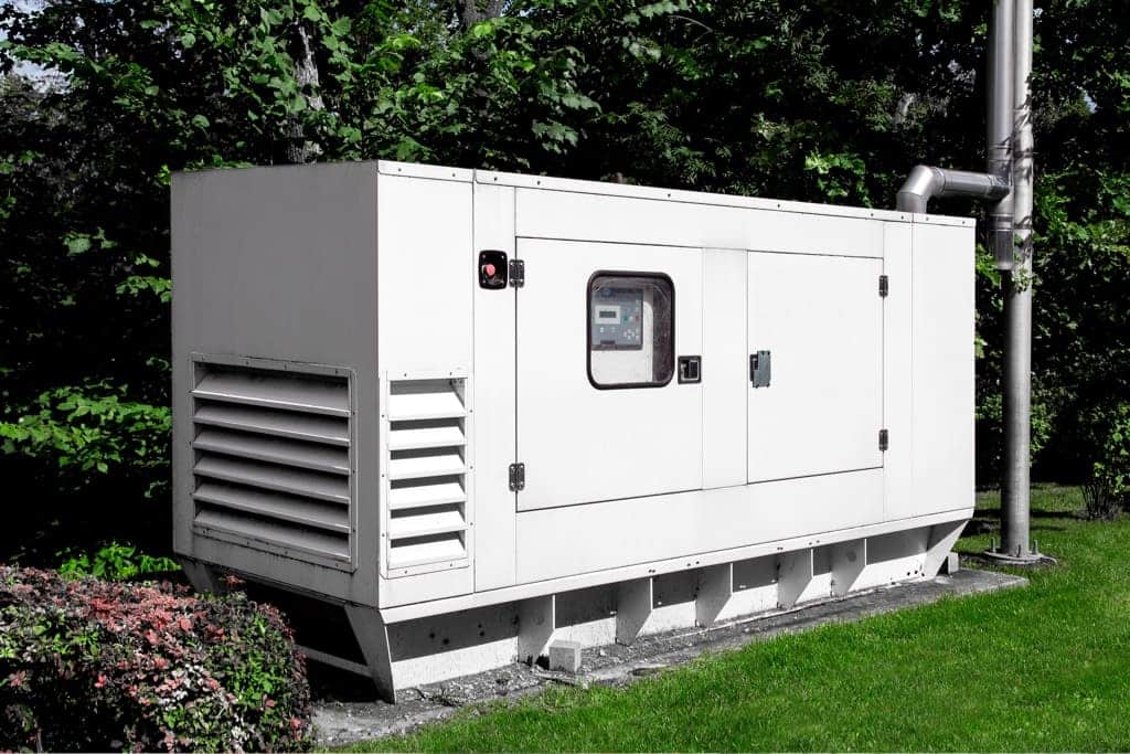 A commercial generator installed outside.